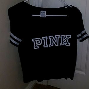 I am selling a v-neck pink shirt.